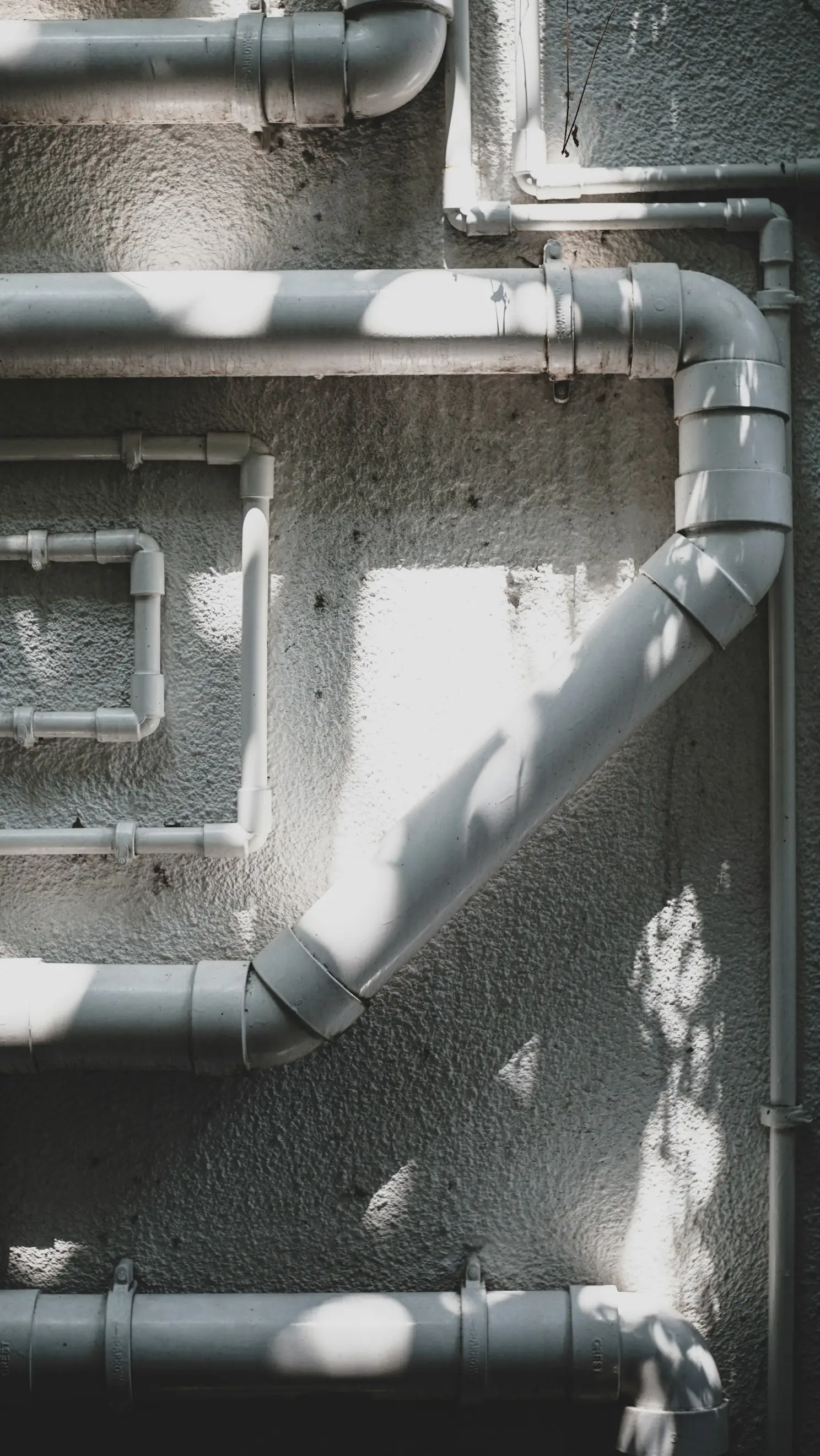 Plastic water and drain pipes prepared for installation